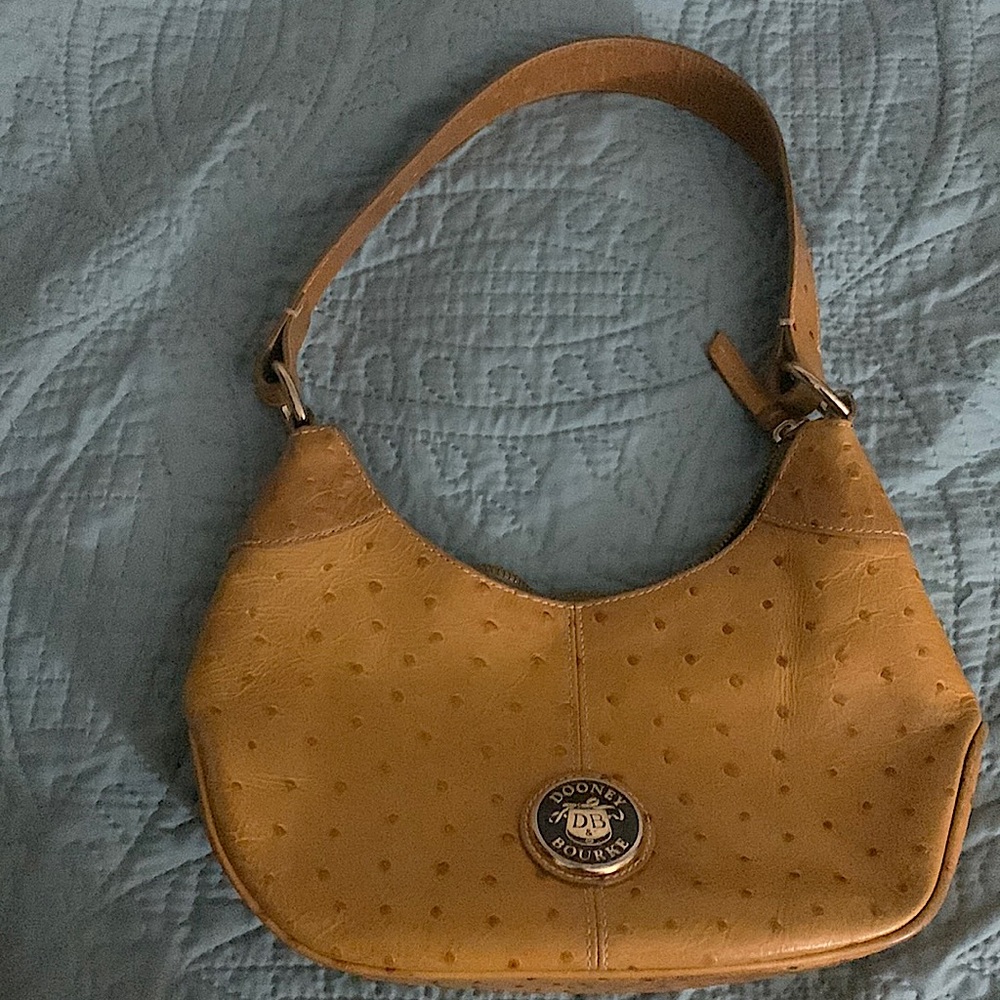 Mustard gold shoulder purse slightly worn but good condition.